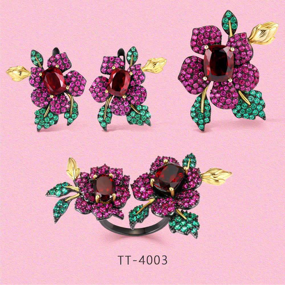 Exquisite flower jewelry set made of S925 sterling silver with rubies.